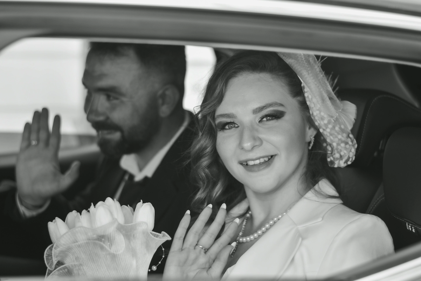 A premium wedding car arriving at a rural wedding venue in Dumfries